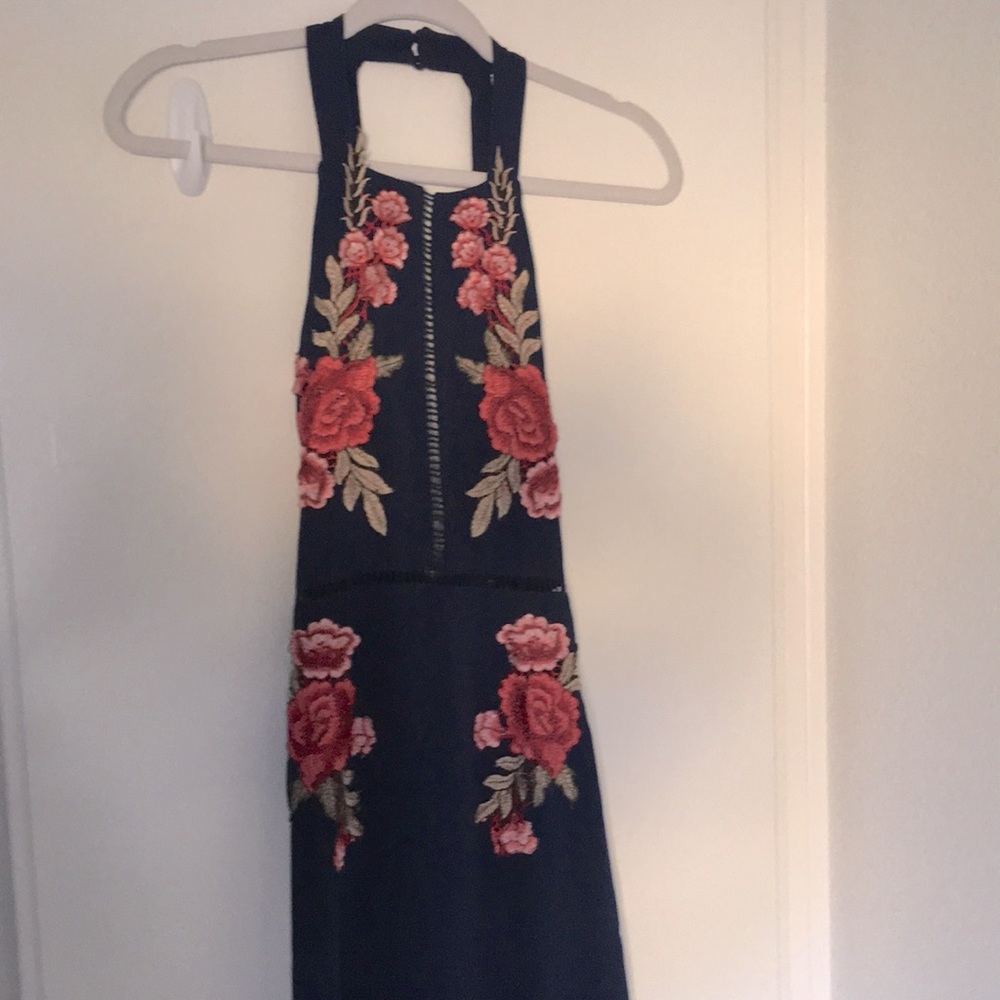 Navy blue maxi with red floral stitch pattern